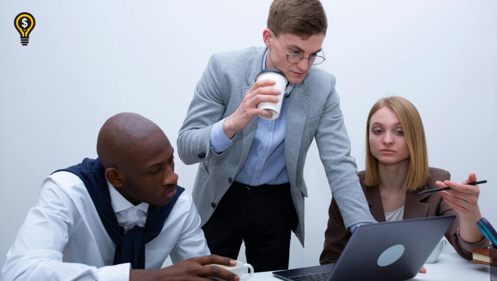 Marketing manager explaining tasks to two employees