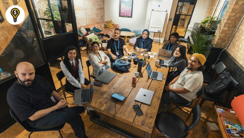 Digital marketing team listening to their manager in a meeting